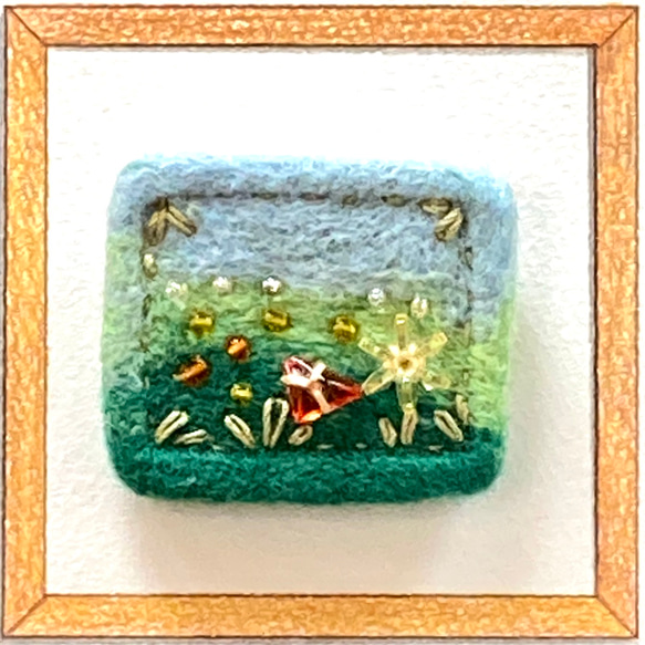 羊毛フェルトのブローチ「花の咲く庭」 1枚目の画像