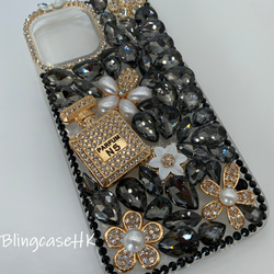 送料無料 ブリング ラインストーン ダイヤモンド 香水瓶 iPhone 15 全機種対応 ケース クリア スマホケース 1枚目の画像