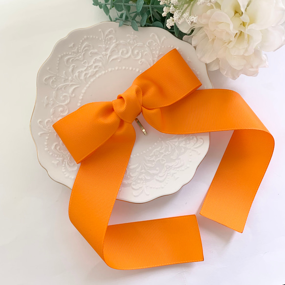 ビッグリボン オレンジ シンプル たらりんリボン リボンヘア