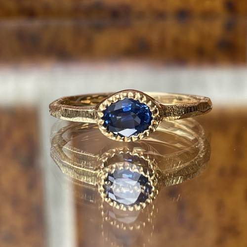 ブルーサファイア オーバルカット 0.774ct ミル打ち留め シルバーSV925