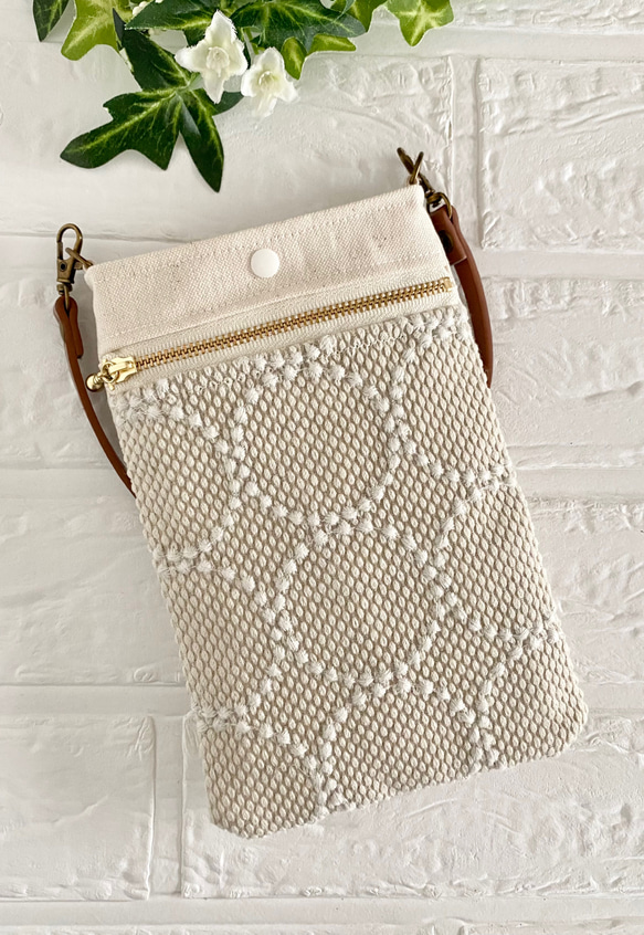 ミナペルホネン タンバリン スマホポーチ スマホポシェット