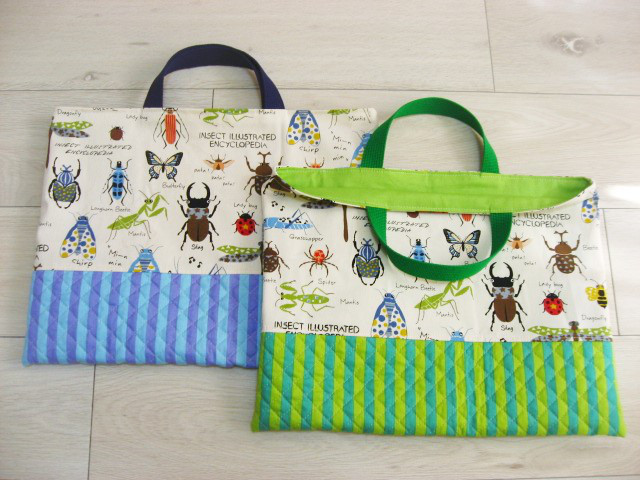 ハンドメイド★キイロストライプ。カラフル昆虫プリント片側紐出し巾着。入園グッズ