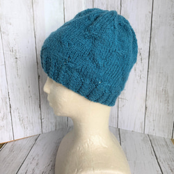 ニット帽、落ち着いたブルー、透かし編み©、毛100％、受注制作 2枚目の画像
