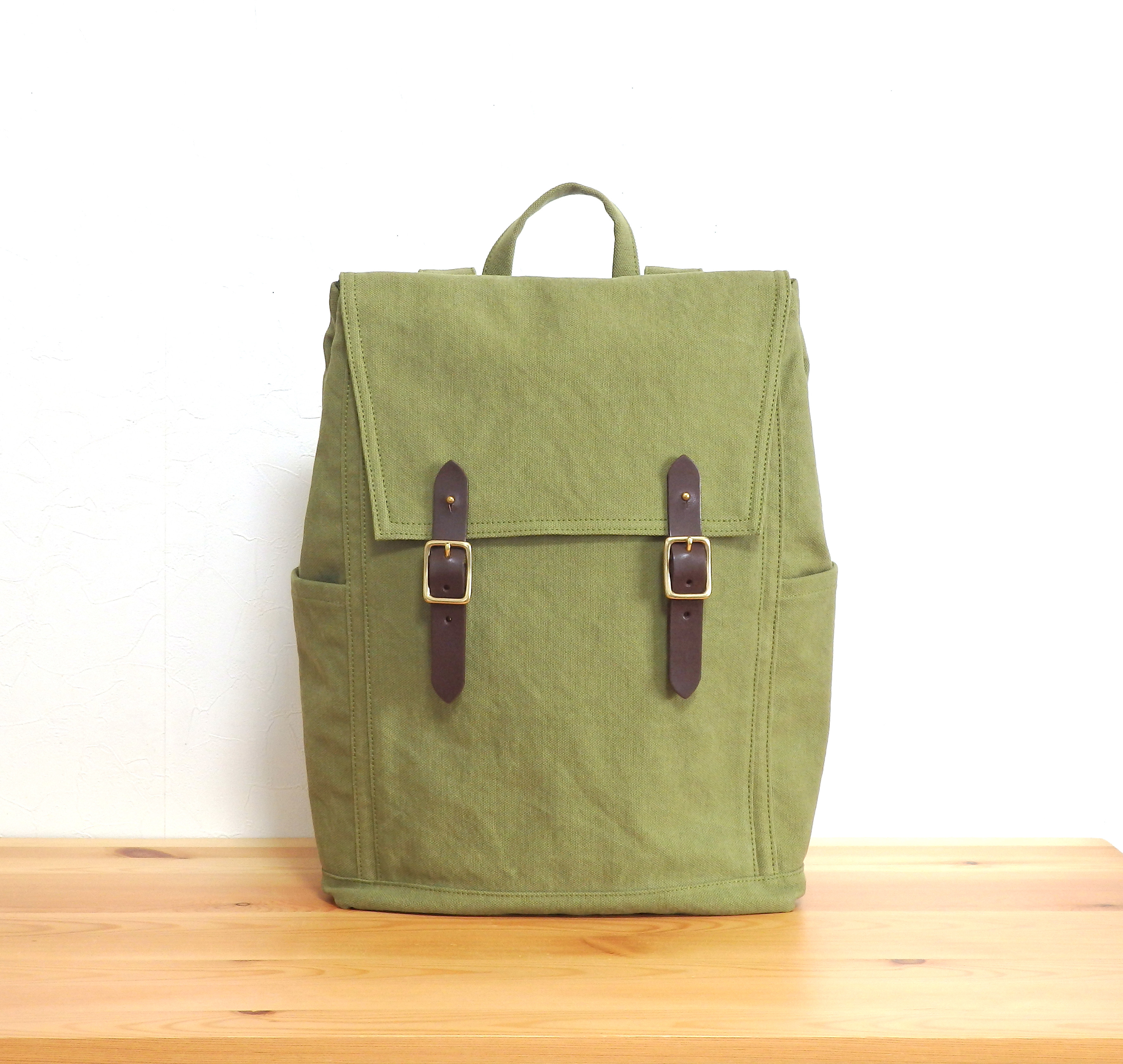 【受注制作】ギボシ留め具の8号帆布バイオウォッシュ加工リュック　モスグリーン