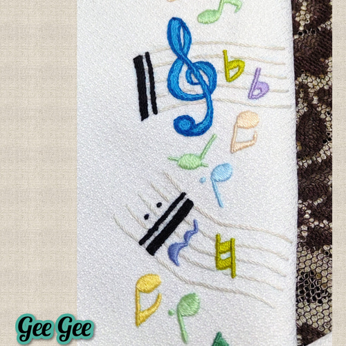 音楽デザインの着物反物 ダークパープル　小紋　ピエロ　音符 音楽デザインの着物反物 ダークパープル 小紋 ピエロ 音符 note