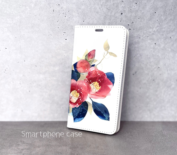 -椿- 花と草木の iPhone 手帳型スマホケース （内側デザイン入り） 1枚目の画像