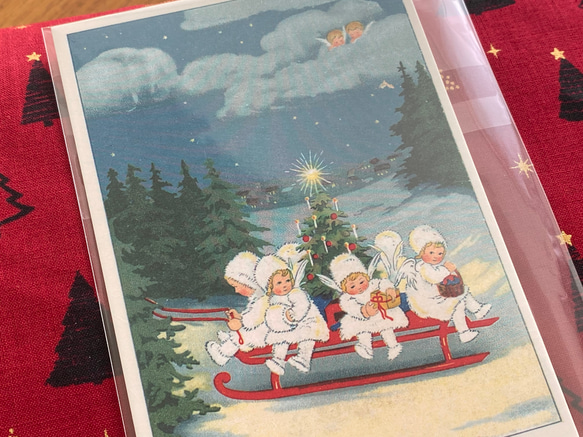 新柄入荷！ドイツより♪クリスマスカード！『アンティーク調 　ポストカード』～ソリに乗る天使たち　１枚～ 2枚目の画像