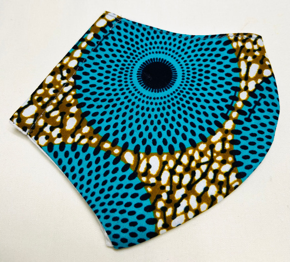 立体マスク・カバー　アフリカンプリント　キテンゲ　臈纈染　からし色✖️ターコイズ　渦巻き　1点もの 2枚目の画像