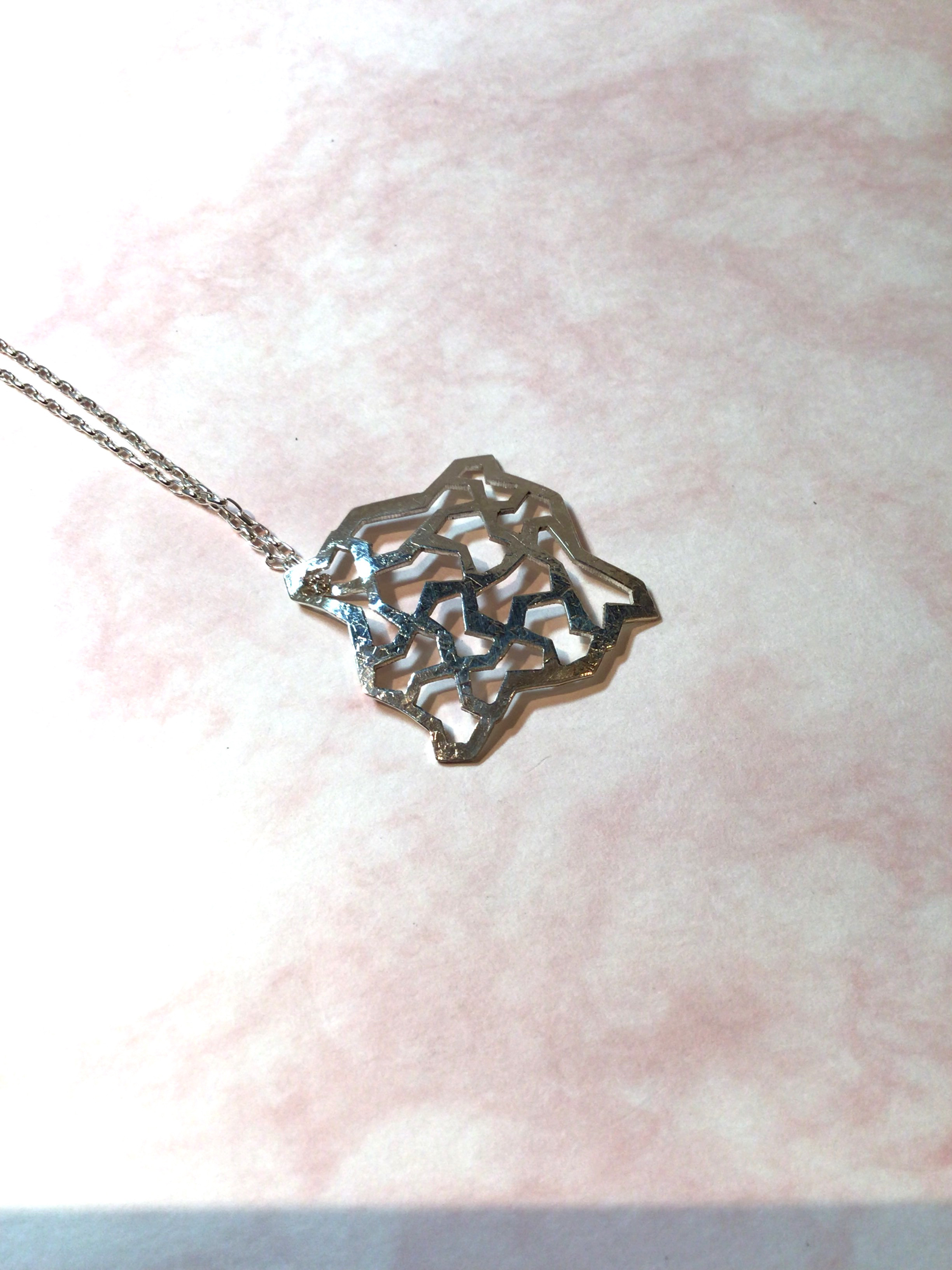 純銀のペンダント　分銅