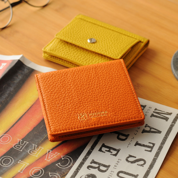 最小レベルでありながら、大容量・丈夫さを両立させてYOSHINA二つ折財布！【オレンジ】 1枚目の画像