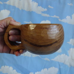スマイルマークが浮かぶ　茶色い真桑の一木彫りコーヒーカップ　 9枚目の画像