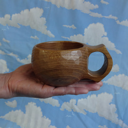 スマイルマークが浮かぶ　茶色い真桑の一木彫りコーヒーカップ　 10枚目の画像