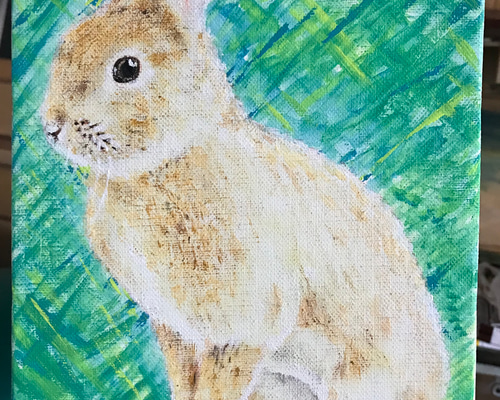 子供とウサギの油彩画