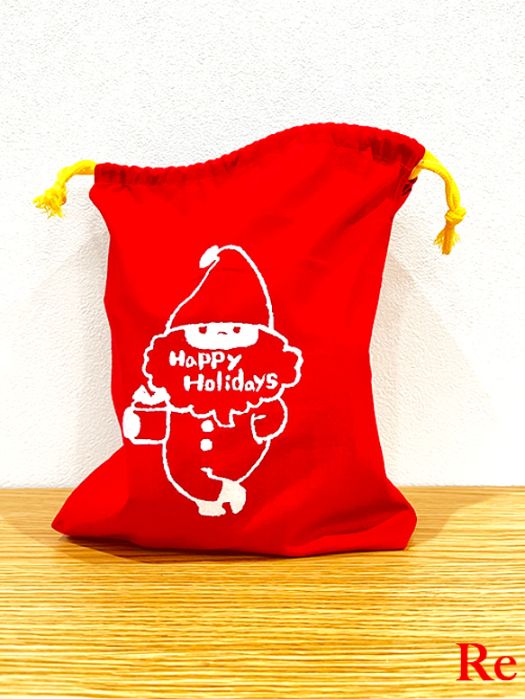 【クリスマスセール　3割引き】サンタの巾着袋　クリスマスプレゼント　ラッピングなどに 1枚目の画像