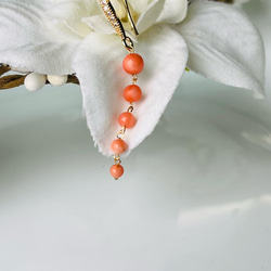琦珍玉寶 入手代表幸福的珊瑚吧❤️ 天然momo珊瑚耳環~修飾臉型的設計款～ 珊瑚圓珠圓潤飽滿~色彩鮮活自然~ 第1張的照片