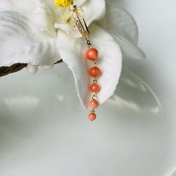 琦珍玉寶 入手代表幸福的珊瑚吧❤️ 天然momo珊瑚耳環~修飾臉型的設計款～ 珊瑚圓珠圓潤飽滿~色彩鮮活自然~ 第4張的照片