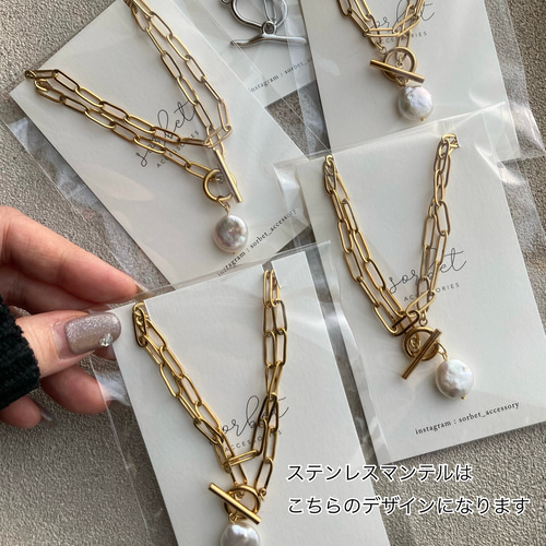 ネパール館 マワール まわーる クルクルネックレス大阪万博 金色の円形