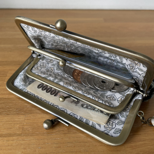 ミナペルホネン タンバリンの親子がま口財布 ネイビー×ライトグリーン