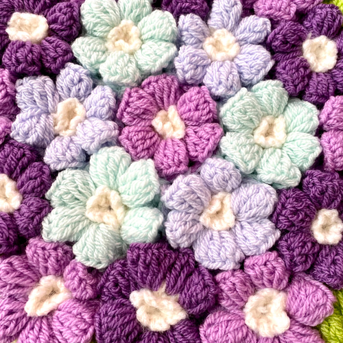毛糸の円座ざぶとん◇ふんわり座布団お花モチーフ、紫色ミックス