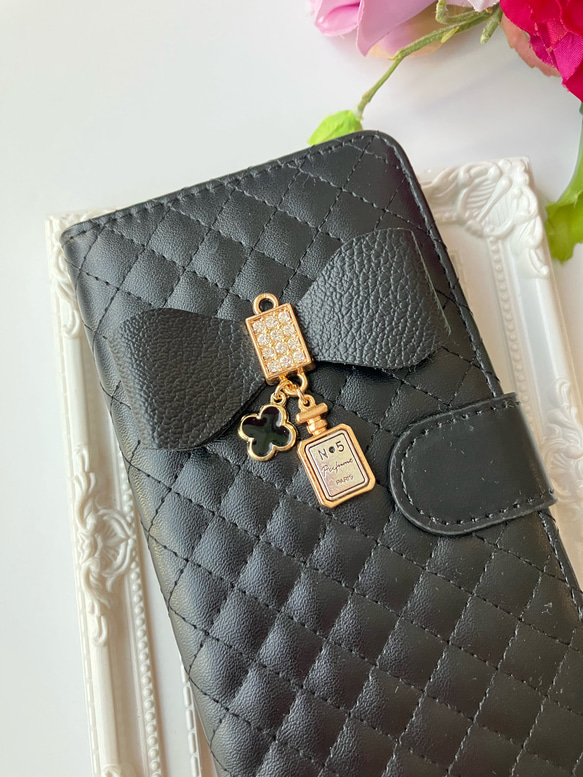 【特集掲載作品】iPhoneケース　スマホケース　リボン☆黒☆手帳型スマホケース　人気　カード収納　13　15　16 2枚目の画像
