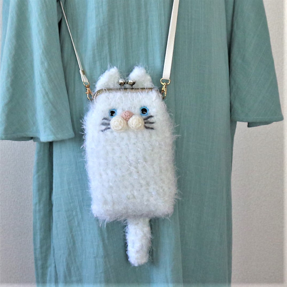 （再販）手編みニットのかわいいネコちゃんの　がま口のスマホポシェット（ペルシャ） 11枚目の画像