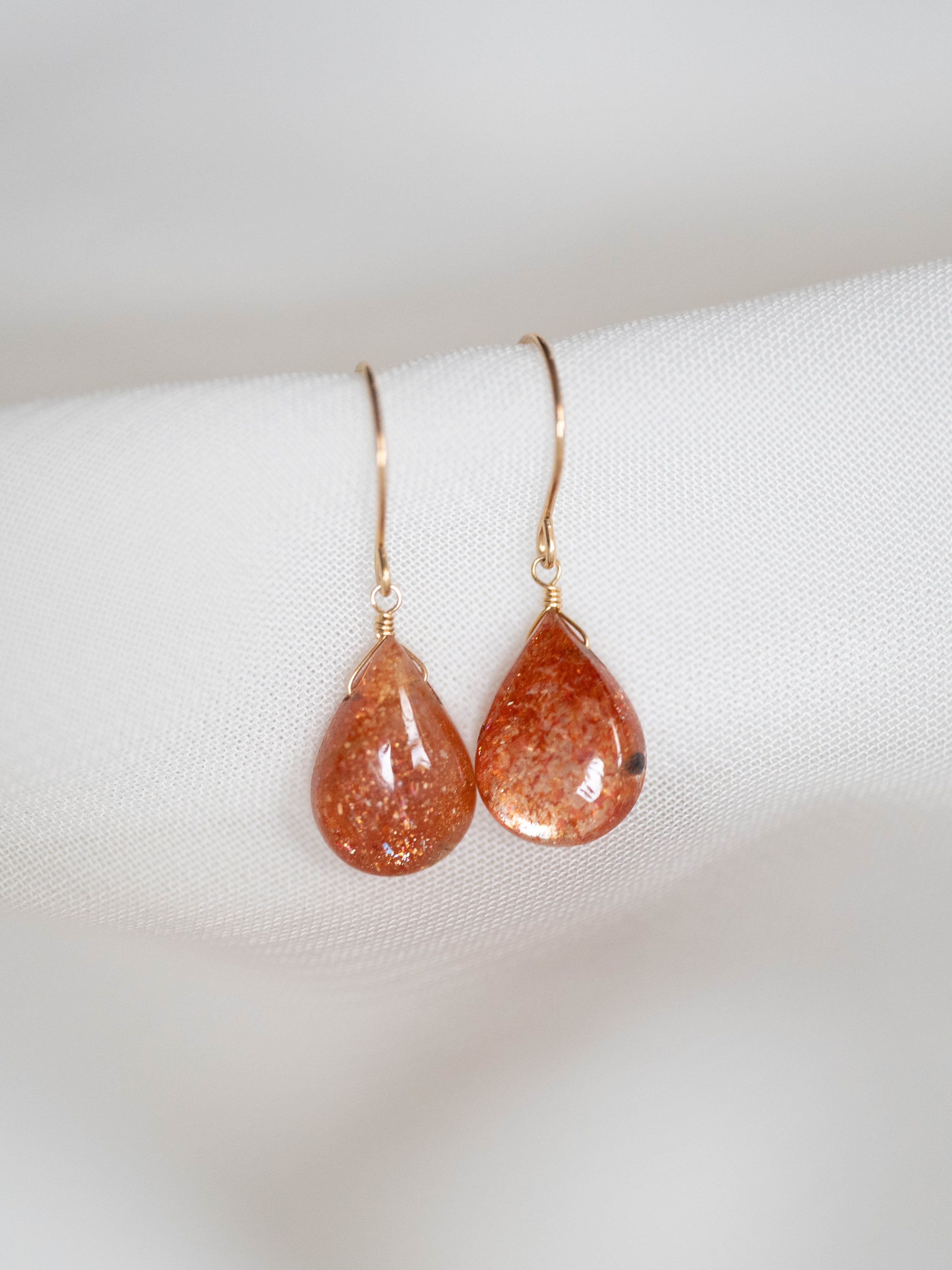 1点もの＊サンストーン ペアスムース ピアス-D