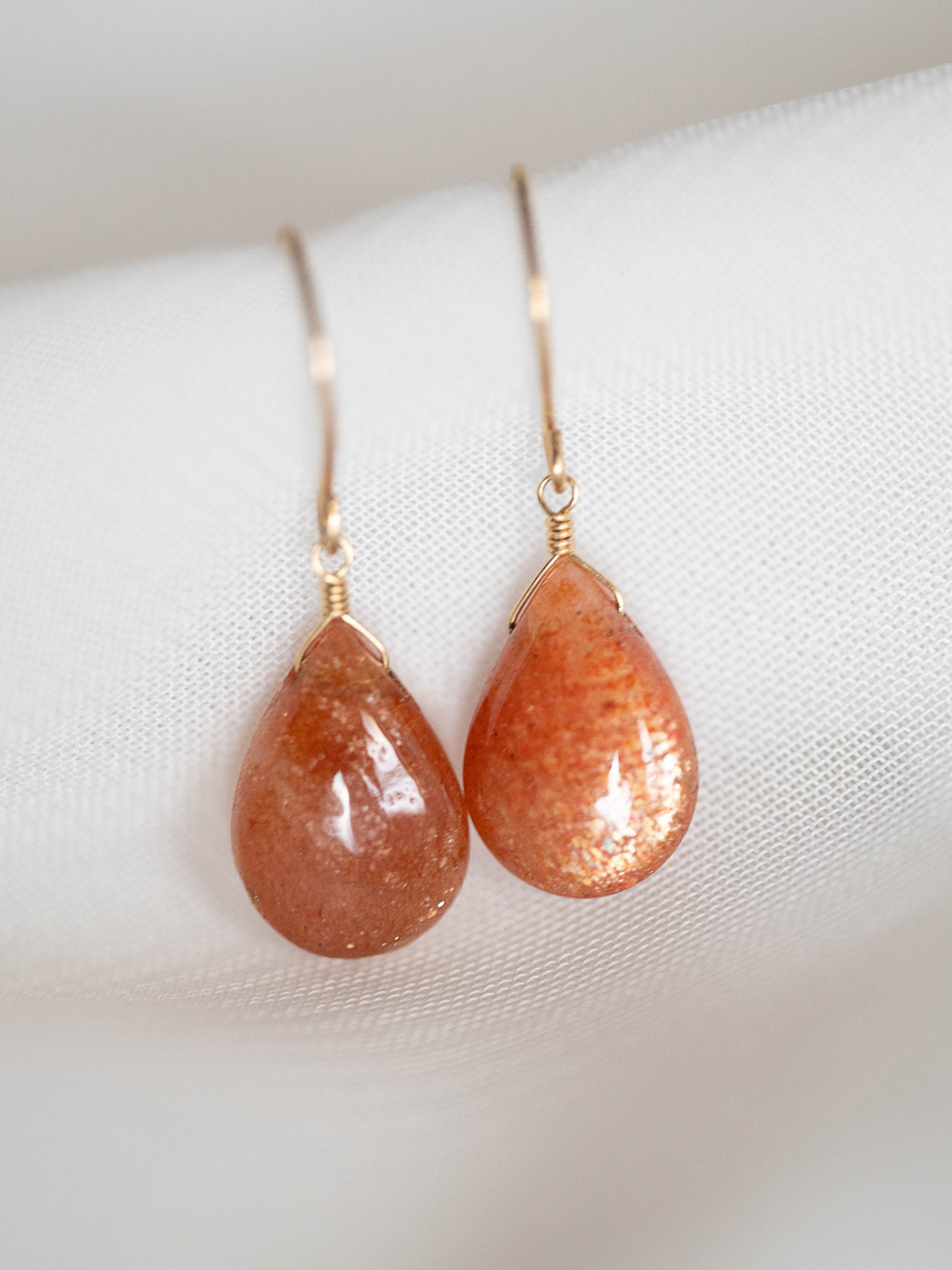 1点もの＊サンストーン ペアスムース ピアス-F