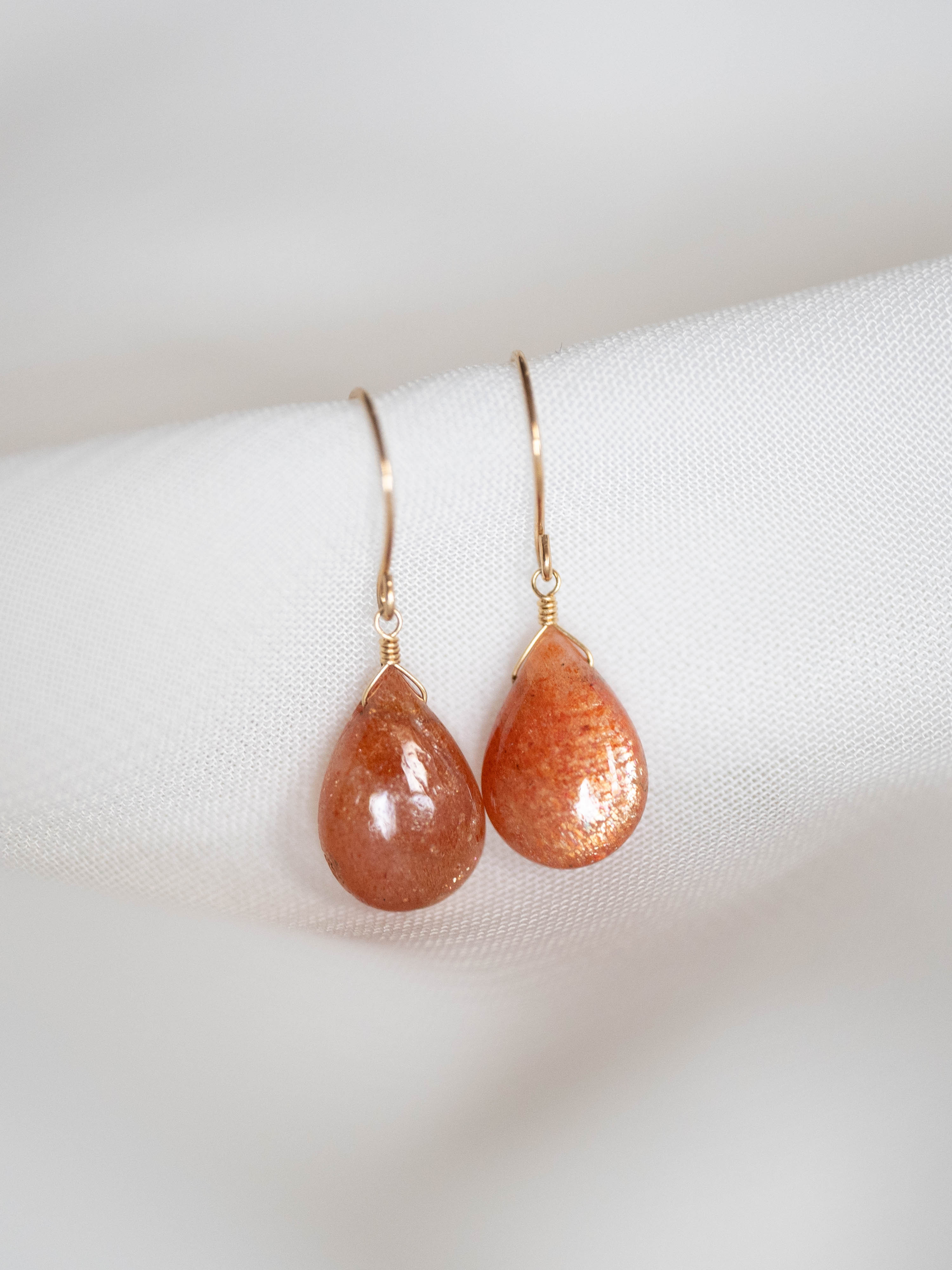 1点もの＊サンストーン ペアスムース ピアス-F