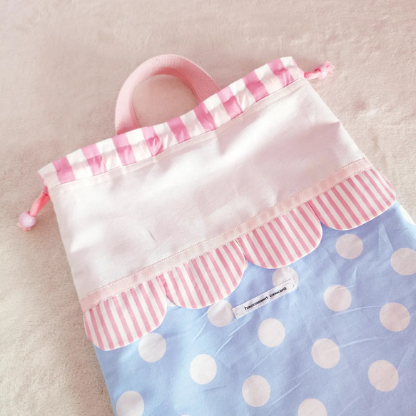 淡色扇貝健身服包，淡藍色，可調整大小 第3張的照片