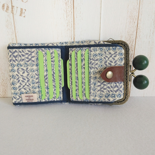 軽くてコンパクトな財布！ミナペルホネン sky flower グリーン木玉