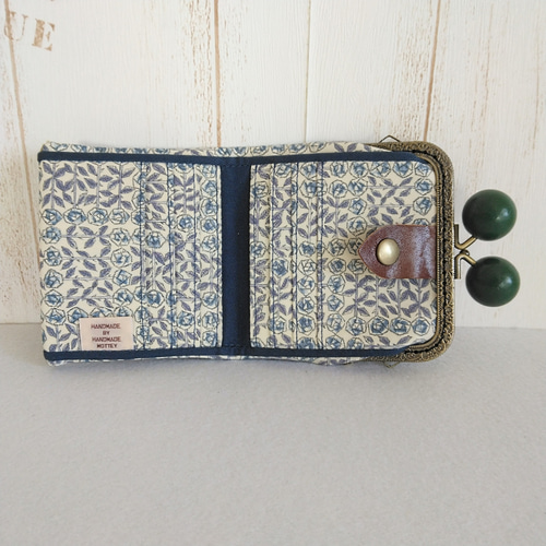 軽くてコンパクトな財布！ミナペルホネン sky flower グリーン木玉