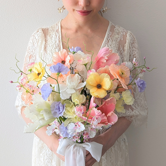 bouquet no.11 チューリップ スイトピー ラナンキュラス オンシジューム ポピー 1枚目の画像