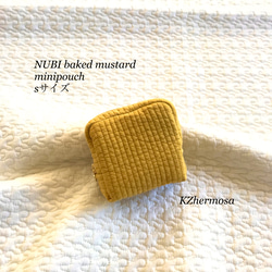 Sサイズ　NUBI  baked   mustard minipouch ミニポーチ　ヌビ　コスメポーチ　 1枚目の画像