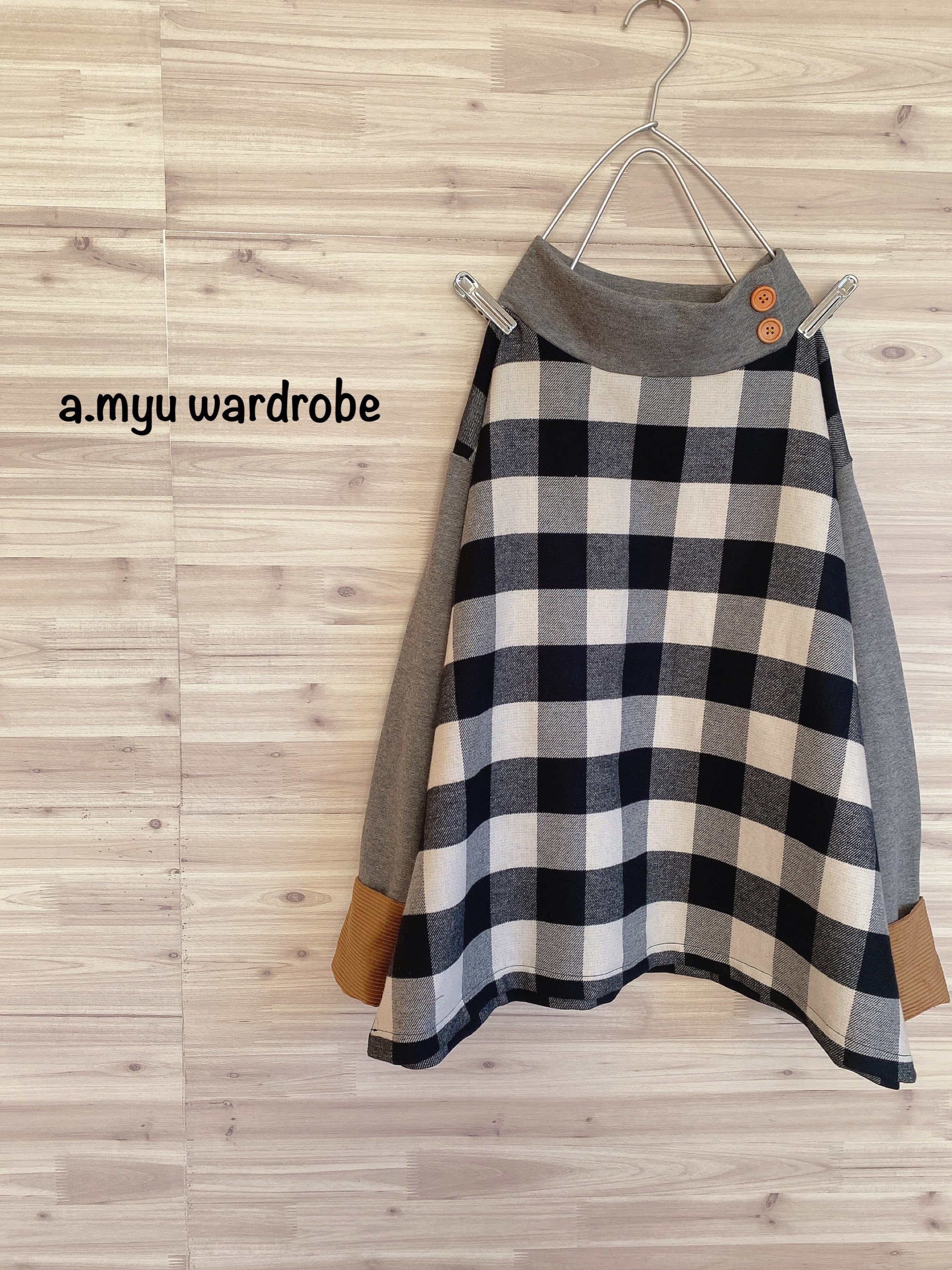 a.myu 異素材ミックス　暖かプルオーバー　オフタートル　黒