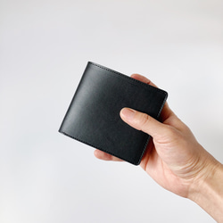 ヌメ革の二つ折り財布 「Bifold wallet (black)」 1枚目の画像