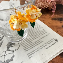 夏にピッタリ⭐︎ひまわりシュシュ　ヘアゴム　レディース　パステルオレンジ 夏にピッタリ⭐︎ひまわりシュシュ ヘアゴム レディース