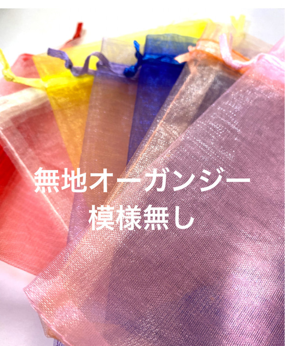 118〜結晶の形をして、オレンジ色のひし形の周りにクリスタルダイヤと，墨色の珠をつけたブローチA 12枚目の画像