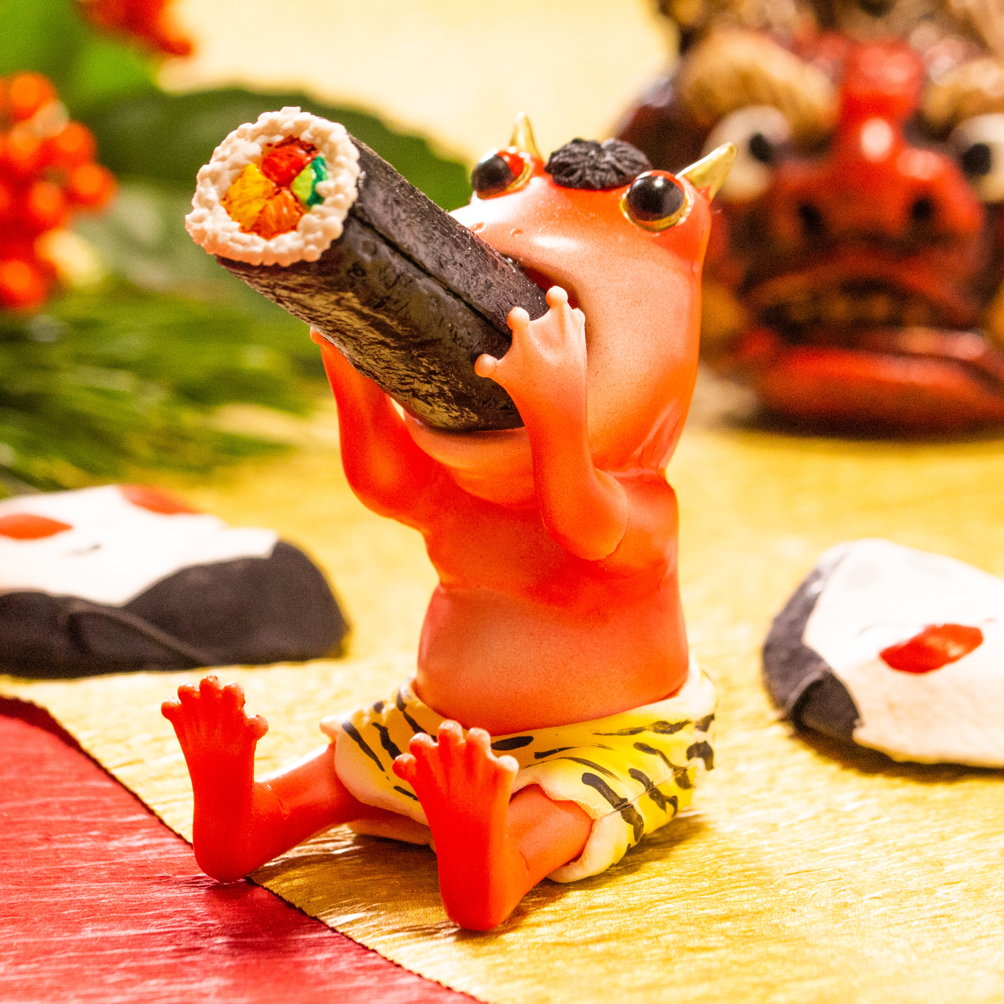 節分で恵方巻を丸飲みする鬼カエルの縁起物