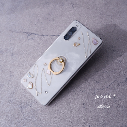 jewel 真鍮のスマホリングとシェルのスマホケース（iPhone
