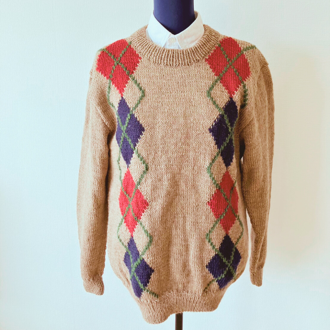 アーガイル柄のユニセックスのセーター