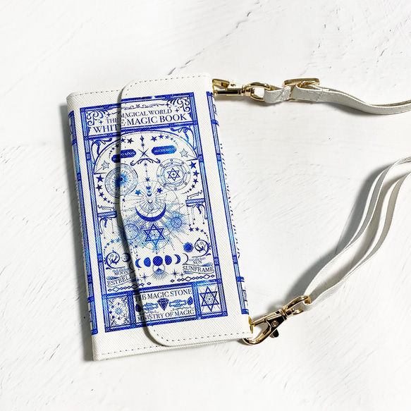 架空の魔導書"白魔法と錬金術の本" ショルダーストラップ付き 三つ折り手帳型スマホケース 2枚目の画像