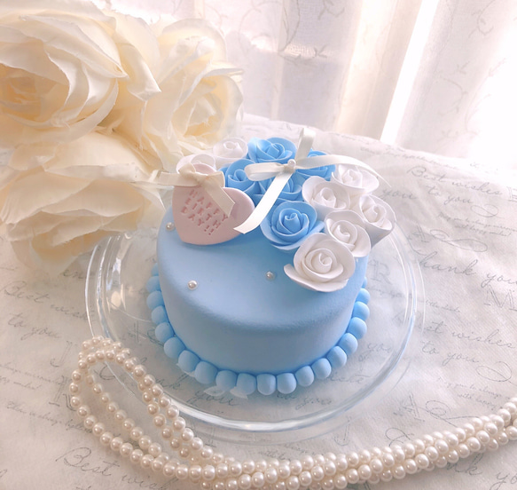 薔薇とりぼんのバースデークレイケーキ リングピロー クレイ