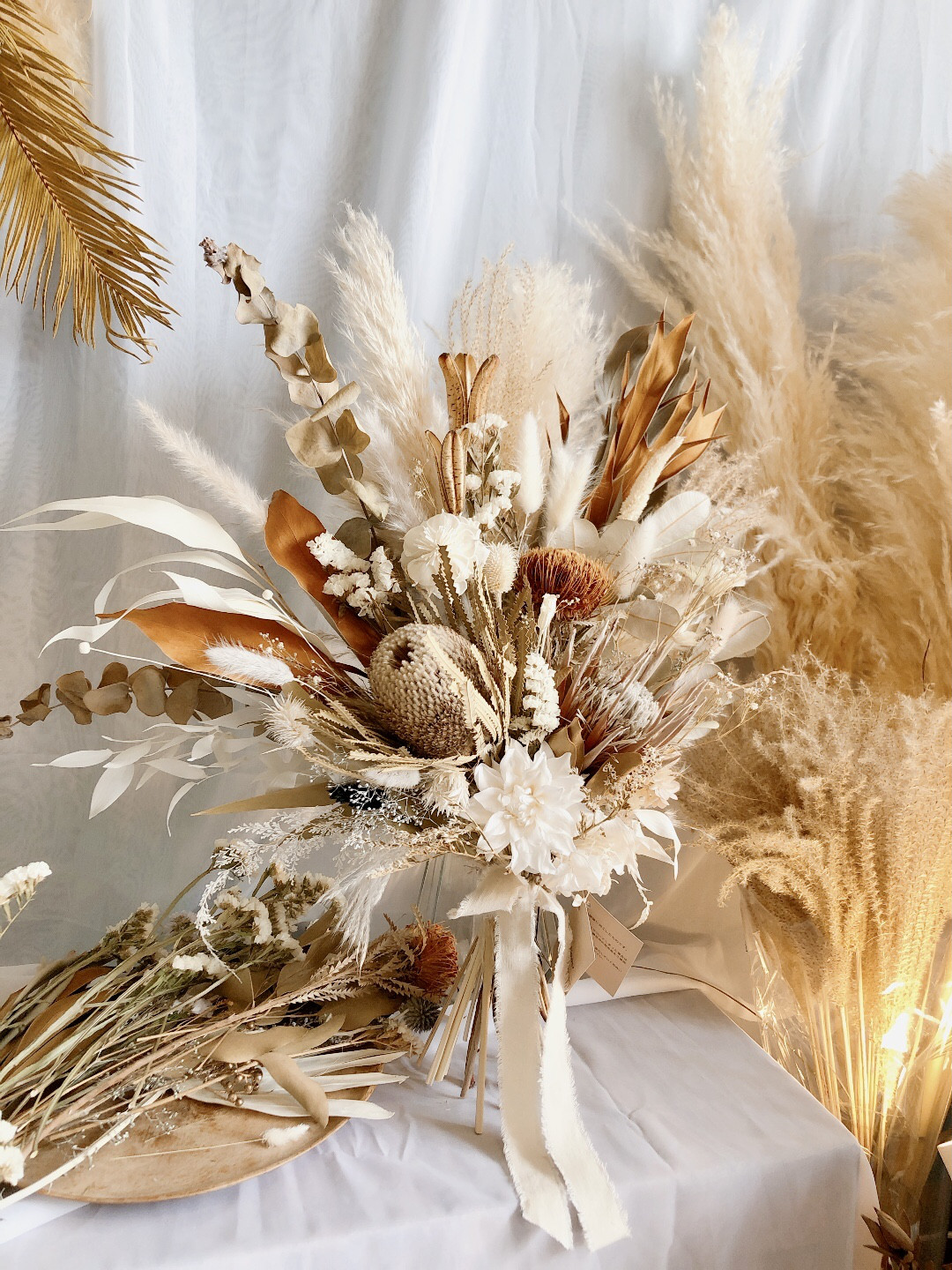 ◇キングプロテアとパンパスグラス モーヴピンクスワッグ◇ブーケ  