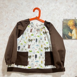 1点限り⭐︎新幹線がいっぱいなスモック ホワイト×カラー 長袖 110  