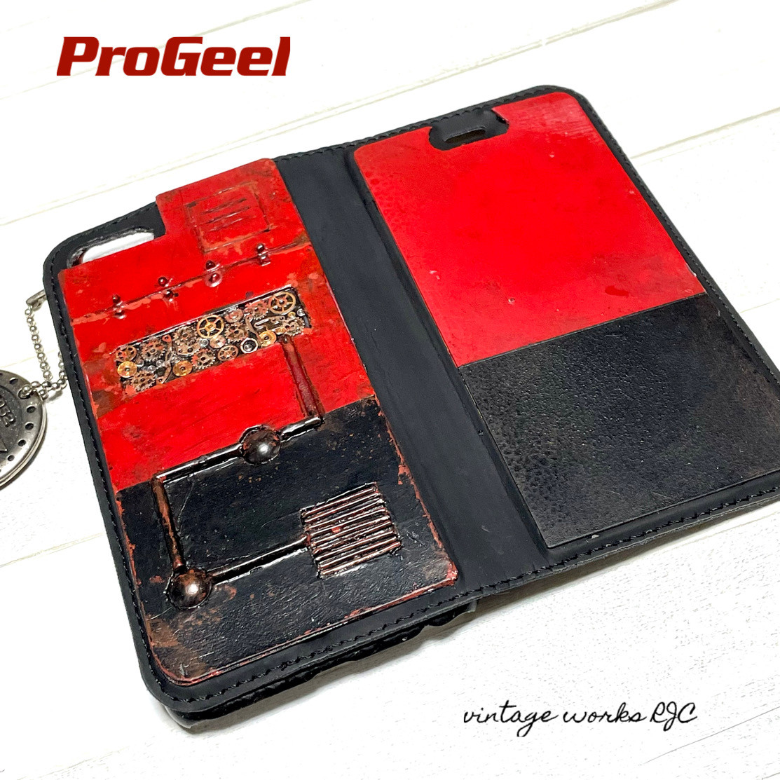 スチームパンクスペースギアRBさび塗装強化iPhone7.8. SE2手帳型 5,135円