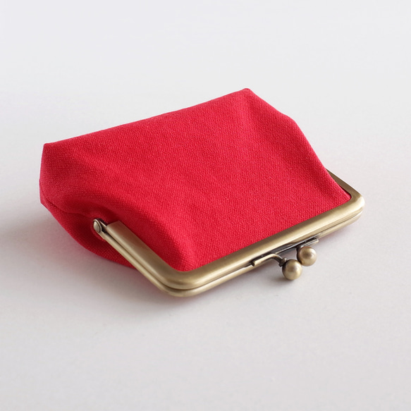 内側が北欧テイストの赤い帆布のがま口ポーチ・ミニ財布 6枚目の画像