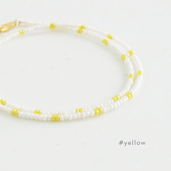 ドットデザイン イエロー × ホワイト ガラスビーズネックレス 黄色 1枚目の画像