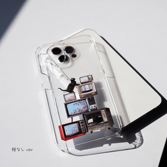 櫻花電視機旁的貓咪圖案 iPhone 手機殼，適用於 iPhone 17+，簡約透明，安卓 第5張的照片