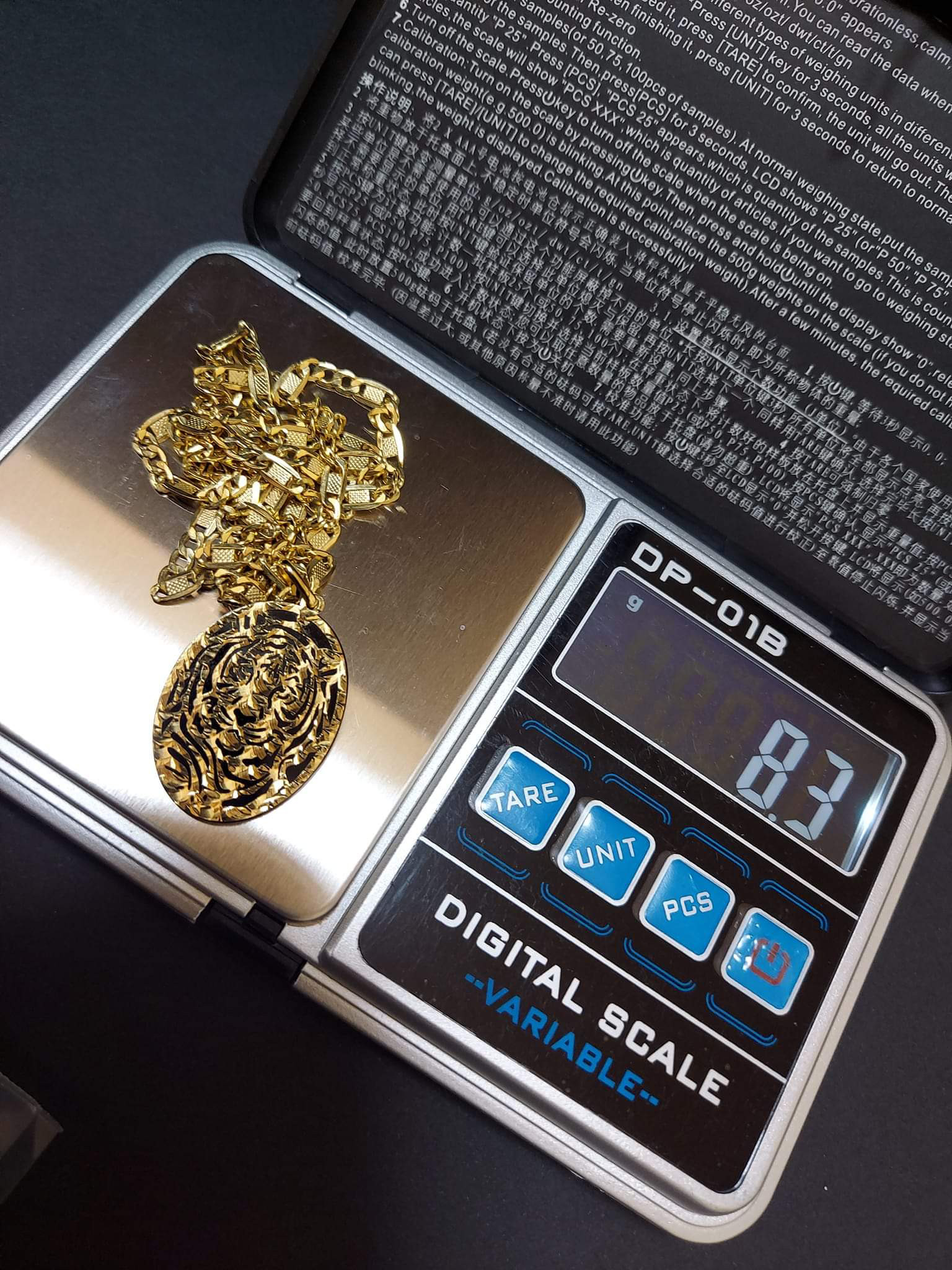 It's an Onyx with 18k Gold molded design.