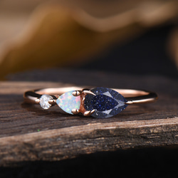 ギャラクシー ブルー サンドストーン リング 10 月の誕生石 ホワイト オパール 結婚指輪 誕生日 記念日 ギフト 1枚目の画像